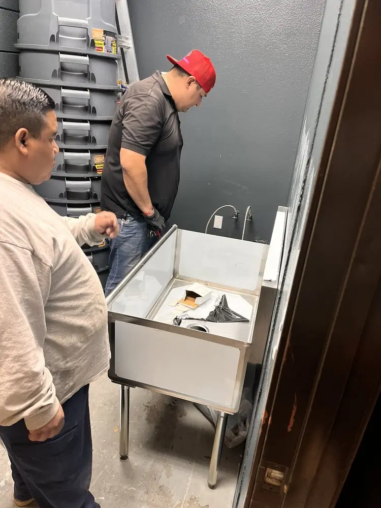 Commercial plumbing and sink installation in Saint James